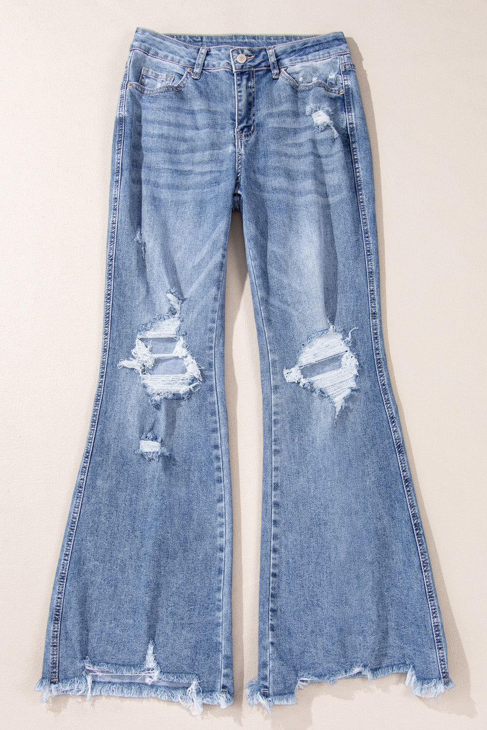 Dusk Blue High Rise Flared Jeans – Ripped & Distressed Hem | Opulent Vibe