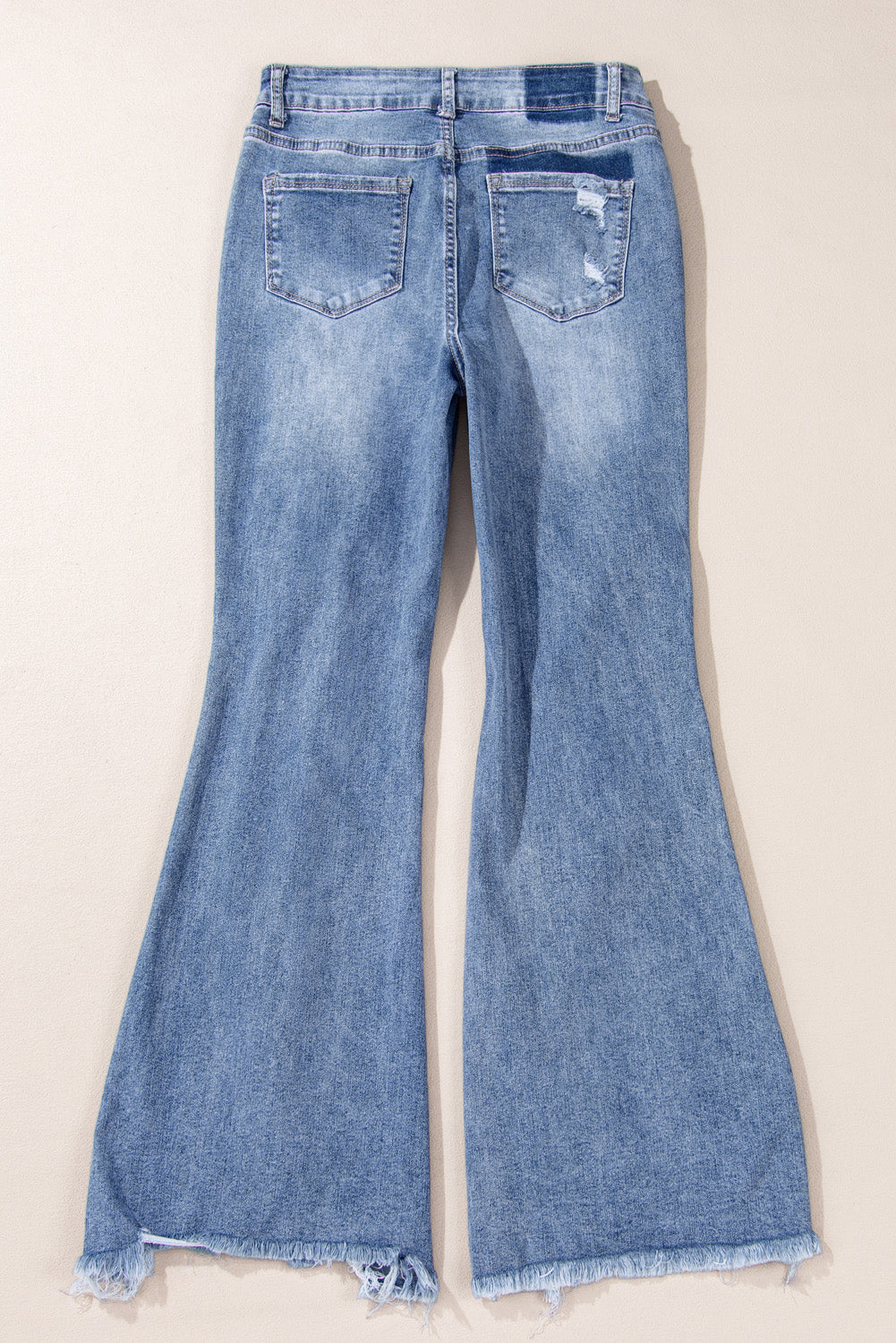 Dusk Blue High Rise Flared Jeans – Ripped & Distressed Hem | Opulent Vibe